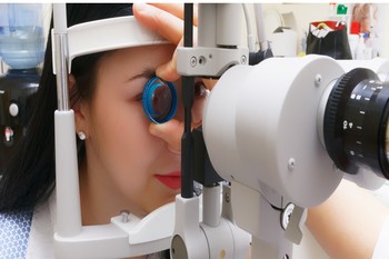 Picture Of Women Getting Eye Exam